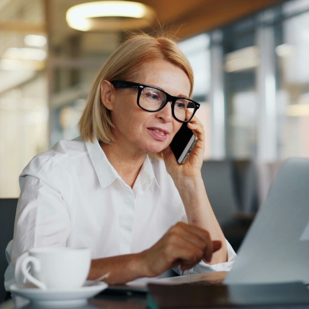Business woman speaking on phone